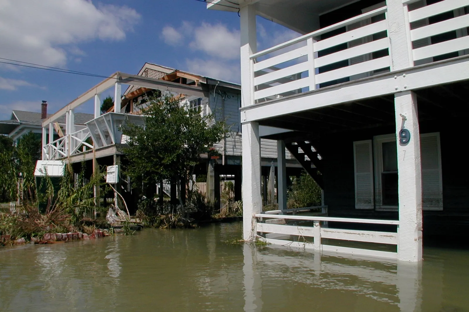 Homes standing in the water after Hurricane Floyd, 1999